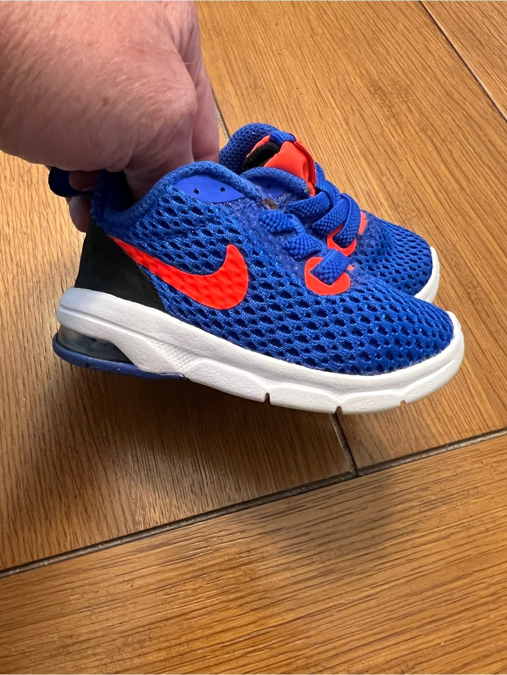 Nike Air Kids Blue Sneakers with Bright Orange Swoosh